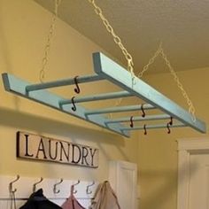 an old ladder for the laundry room - perfect for hanging things to dry