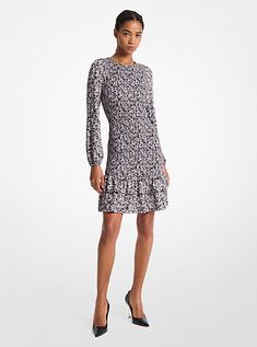 This long-sleeve dress will take the guesswork out of day-to-dark dressing. Made from matte jersey with lots of stretch, it features allover smocked detailing for a figure-flattering fit and descends to a ruffled mini hemline. Keep emphasis on the floral print with noir pumps. Classic Romantic Style, Floral Jumpsuit, Romantic Style, Emphasis, Jersey Dress, Floral Print Dress, Sleeve Dress, Jumpsuit Dress, Smocking