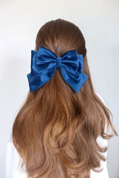 Introducing our exquisite Handmade Velvet Bow Clip, oversized edition, designed to elevate your style with its timeless elegance. Crafted with meticulous attention to detail, this accessory effortlessly combines luxury and versatility, making it the perfect addition to your collection. Made from premium quality velvet, Blue Hair Bow, Blue Hair Bows, Hair Bow Clip, Bow Clip, Velvet Bow