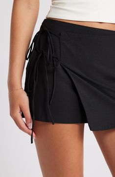 A solid hue amps up the versatility of a wrap miniskirt secured by twin ties at the side. True wrap style with side tie closure 100% polyester Dry clean Imported Fabric Gift Bags, Nordstrom Store, Fabric Gifts, Free Fabric, Anniversary Sale, Black Fits, Wrap Style, Twins, Mini Skirts