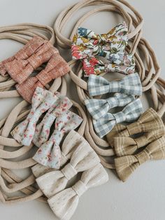 several bow ties laid out on top of each other