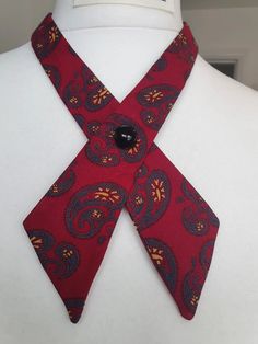 this tie is fully self adjusting and it has a pin as closure so you can decide how to 'pin' your tie. strawberry red paisley 70's print from a genuine vintage cravat. Momo Handmade supports circular, sustainable fashion, and these ties are upcycled from genuine vintage ties.  Each tie is 1 of a kind. It looks good with a shirt or just with a plain top to make the tie stand up. Vintage Ties, Red Paisley, Unique Accessories, Plain Tops, Quirky Gifts, Tie Accessories, Suit And Tie, Audrey Hepburn, Birthday Present