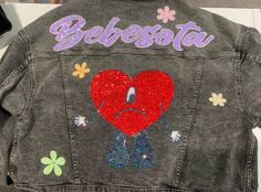 Where all my bebesotas at?? Jean jacket in machine wash black color with an oversized fit!! Customized with bebesota rhinestones and un verano sin ti logo heart. Flowers do glow in the dark with our holographic glow in the dark vinyl Any questions please message us!! Thank you, J B Designs Bd Gifts, Valentine Backgrounds, Chicano Clothing, Day Wallpaper Aesthetic, Background Valentines Day, Wallpaper Hearts, Custom Jeans Diy, Valentine Wallpaper, Valentines Wallpaper Iphone