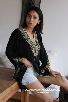 This is a Moroccan Tunic Shirt, ideal for any casual wear. With a unique embroidery pattern, this tunic shirt will surely be a wonderful one-off item! Wear it with casual jeans, or black trousers and you will be sure to create a bohemian chic impact to everyone... Bohemian V-neck Blouse For Festive Occasions, Festive V-neck Kurta For Vacation, V-neck Embroidered Blouse For Vacation, Summer Festive V-neck Tunic, Festive Tunic Kurta For Vacation, Festive Bohemian V-neck Tunic, Bohemian Tunic Kaftan For Holiday, Bohemian Embroidered Top With Chikankari And V-neck, Bohemian Chikankari Embroidered V-neck Top