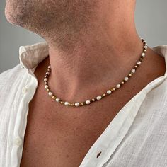 Geniune Freshwater Pearl Gold Necklace is elegance on your neck. Discover the privilege that perfect mens necklaces for modern people will create in your style.  Features of the necklace: - Pearl size: 6mm freshwater pearl - Pearl color: White - Luster: High - Beads quality: AAA + - Diamond Cut Rhodium Gold Bead - Hematite - Clasps: Stainless steel gold lobster clasp  - Necklace size: 18"(46 cm), 19"(48 cm), 20"(51 cm), 21"(53 cm), 22"(56 cm) and 23"(58 cm)  You may choose extra chain extension Classic Gold Necklace With Gemstone Beads, Men’s Pearl Necklace, Pearl Necklace Men, Pearl Gold Necklace, Gold Necklace For Men, Pearl Jewelry Sets, Gold Pearl Necklace, Freshwater Pearl Necklace, Real Pearls