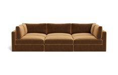 a brown couch sitting on top of a white floor