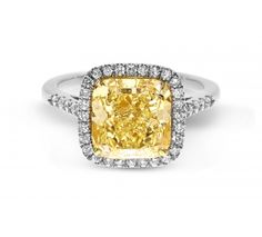 Rare and unique, this fancy light yellow cushion diamond will send out in any crowd. #wedding #engagement