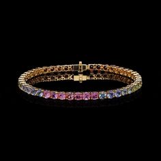 Rainbow sapphire gemstone bracelet 18k gold jewelry / Jewelry for women / Multi Sapphire Jewelry Bracelet for her / Sapphire tennis bracelet STONE DETAILS : ❋ Stone : Rainbow Sapphire ❋ Stone Size : 3.50 MM Approx. (± 0.20 MM) ❋ Stone Shape : Round Cut ❋ Stone Weight : 8.910 Cts. Approx. ❋ Stone Type : Natural METAL DETAILS : ❋ Metal Purity : Solid 18K Gold  ❋ Metal Color : Yellow Gold ❋ Bracelet Length : 6.50 Inches Approx. ❋ Gross Weight : 10.130 Gms. Approx. ❋ Gold Net Weight : 8.347 Gms. App Fine Jewelry Sapphire Tennis Bracelet With 17 Jewels, Elegant Multi-stone Round Tennis Bracelet, Elegant Multi-stone Tennis Bracelet, Yellow Gold Multi-stone Tennis Bracelet, Gold Multi-stone Tennis Bracelet, Hand-set Sapphire Bracelet As Gift, Formal Yellow Gold Multi-stone Tennis Bracelet, Formal Multi-stone Yellow Gold Tennis Bracelet, Sapphire Gemstone Bangle Jewelry