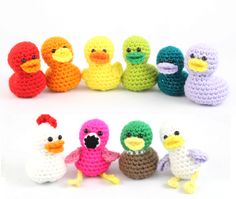 several crocheted rubber ducks sitting next to each other