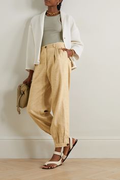 Pleats at the waist and tapered hems add an extra touch of volume to Loro Piana's 'Phyllis' pants. They've been tailored in Italy from sumptuous linen, cashmere and silk-blend tweed with a speckled finish and fit loosely through the legs. Style yours with a tank and flats. Chic Cuffed Ankle Pants For Workwear, Lolo Piana, Giorgia Tordini, Cashmere Pants, High Rise Pants, Silk Pants, Tapered Pants, Pleated Pants, Loro Piana