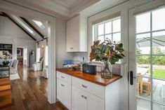 the kitchen is clean and ready to be used as a dining room or living room