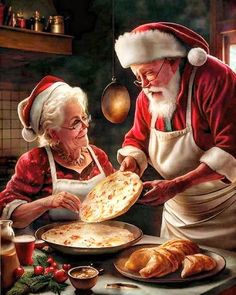 an older man and woman preparing food for christmas