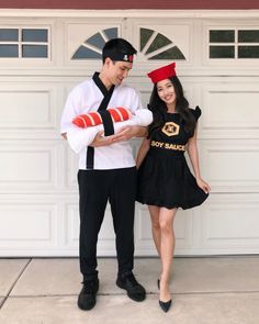 a man and woman dressed up in costumes