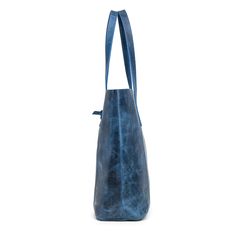 NEW Levinson Leather Goods Spring 2024 Women's Collection Made from top quality buffalo leather in a vibrant blue shade, our Elodie Buffalo Leather Tote Bag is all about effortless chic. With plenty of room inside and a sturdy build, it's your go-to for everyday adventures, adding a pop of color and laid-back charm to any outfit. Features: Leather top handle Leather loop closure Internal key ring strap Unlined interior Material: Made of premium vegetable-tanned water buffalo leather in blue colo Luxury Blue Soft Leather Hobo Bag, Luxury Turquoise Tote Shoulder Bag, Luxury Blue Calf Leather Shoulder Bag, Leather Duffel Bag, Leather Duffel, Water Buffalo, Everyday Adventures, Buffalo Leather, Leather Bag Women