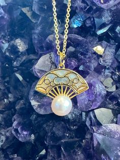 Chinese fan shaped pandent with white fresh pearl. Glod plated. Fan is made with mother of pearl. Glod plated chain comes with the pendent. Chinese Fan, Ancient Chinese, Mother Of Pearl, Chains Necklace, Freshwater Pearls, Plating, Chain