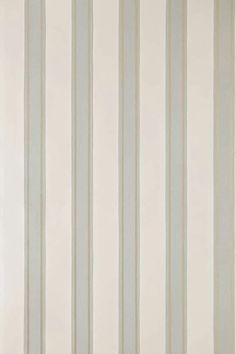 a white and grey striped wallpaper with vertical stripes