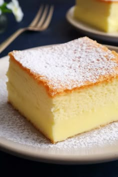 a piece of cake sitting on top of a white plate