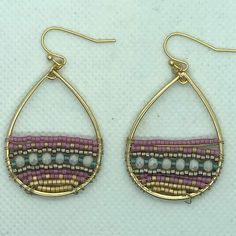 New From My Store Inventory. Slightly Larger Than The Earth & Sky Earrings Listed, These Are 1 1/8" Wide And Total Drop Is 2 Inches. Hand Strung Seed Beads Are Wired In Place At The Bottom Of The Pear Shape. Pretty Shade Of Pink. As Always, The Setting Is 18-Kt Gold Plated For Durability. Pink Wire Wrapped Teardrop Earrings, Pink Nickel-free Beaded Drop Earrings, Pink Metal Jewelry With Colorful Beads, Elegant Pink Metal Beaded Earrings, Elegant Pink Beaded Metal Earrings, Nickel-free Pink Dangle Beaded Earrings, Pink Metal Jewelry With Dangling Beads, Nickel Free Pink Dangle Beaded Earrings, Pink Nickel-free Dangle Beaded Earrings