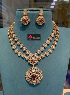 Beautiful & unique Ruby kundan stone Victorian set . Most trending collection!! DETAILS: Includes one necklace and two earrings. Weight with Earring : 124.5g Length : 18cm Type : Close necklace or can be adjusted with extension thread . Material: Imitation, kundan stone.  Base Material : Brass/Copper  Finish: Premium-quality, Rodium Victorian finish.  PRODUCT CARE: - Avoid contact with heat/fire, water, and chemicals such as perfumes or any sprays to prevent product damage.  - Store it in provided white base cover & box Luxury 22k Gold Victorian Jewelry, Temple Style Kundan Necklace For Anniversary, Gold Kundan Necklace With Stone Work For Anniversary, Festive Kundan Necklace For Anniversary, Kundan Necklace For Anniversary And Festivals, Fire Water, Brass Copper, Copper Finish, Covered Boxes