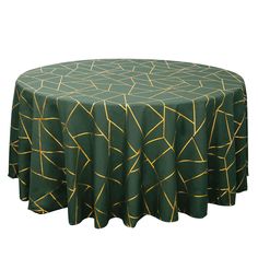 a round table with green and gold lines on the top, sitting in front of a white background