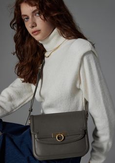 Inspired by Grace Kelly's enduring style, the Grace Medium Flap Bag is a timeless embodiment of classic elegance. This exquisite bag elevates sophistication with its signature lock closure, inspired by a vintage door handle. Crafted with full-grain textured calfskin from USA, this versatile companion strikes a harmonious balance between modern minimalism and timeless charm. Elegant Workwear Bags With Turn-lock Closure, Elegant Shoulder Bag With Turn-lock For Work, Elegant Shoulder Bag With Turn-lock Closure For Work, Elegant Crossbody Satchel With Cc Turnlock Closure, Luxury Bags With Cc Turnlock Closure For Work, Timeless Crossbody Shoulder Bag, Classic Office Flap Bag With Hasp Closure, Timeless Shoulder Bag With Detachable Strap, Timeless Satchel With Hasp Closure