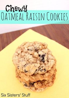 a stack of oatmeal raisin cookies sitting on top of a yellow napkin