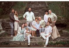 a family posing for a photo on some steps