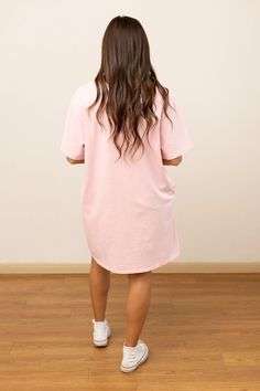 The "See You Later Alligator" on Pink Wash Tee Shirt Dress features a relaxed, oversized fit with pockets and a playful graphic. It offers some stretch, has a crew neck, and hits above the knee for most body types. Unlined for breathable comfort.Model & Fit Model: Elena (5' 8" and Size 6 or M) is wearing our size S/M Fit: Relaxed, Oversized Unlined Some-Stretch Pockets Crew Neck Length hits above knee for most body types Fabric & Care Material: 100% Cotton Care Instructions: Hand Wash with Cold Oversized Short Sleeve T-shirt With Side Pockets, Oversized Graphic Print T-shirt Dress With Crew Neck, Oversized Cotton T-shirt Dress With Graphic Print, Cotton T-shirt Dress With Graphic Print, Relaxed Fit, Casual Cotton T-shirt Dress With Relaxed Fit, Relaxed Fit Crew Neck T-shirt Dress For Spring, Casual Graphic Print T-shirt Dress, Oversized Crew Neck T-shirt Dress For Spring, Casual Cotton T-shirt Dress With Crew Neck