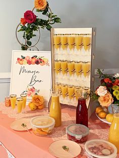 a table topped with lots of food and drinks