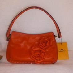 This Bag Is From The Floral Bouquet Collection. This Bag Is A Beautiful Almost A Mauve Coral With Polished Gold Tone Hardware. Orange Evening Bag For Spring, Orange Evening Bags For Spring, Spring Orange Leather Bags, Floral Bouquets, Orange Pink, Pink Orange, Color Orange, Pink And Orange, Gold Tones