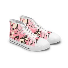 Stand out in these cute Pink Camo Sneakers! You'll love these retro sneakers! Made with breathable polyester canvas and featuring hi-poly deodorant memory foam insoles, these women's high top sneakers bear all the marks of an awesome shoe. Choose between black or white sole and laces, and enjoy the silver metal eyelets along with the lace-up closure. Add your designs and bring a bespoke staple to life.  .: Breathable polyester canvas .: Hi-poly deodorant memory foam insoles .: EVA shock-absorbing layer .: Durable rubber outsole .: Black or white decoration Pink High-top Canvas Shoes For Streetwear, Pink Lace-up High-top Sports Sneakers, Pink Lace-up Cotton High-top Sneakers, Pink Camouflage Shoes, Pink Lace-up Sneakers With Cushioned Footbed, Camo Sneakers, Camouflage Design, Pink Camouflage, Camo Designs