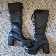 Brand: Roc Boots Austrailia Color: Black Size: 9 (Aus 40) Length: Boots Sit Below The Knee Width: Narrow, Not For Wider Feet. Practically Brand New; Only Worn Once For A Couple Of Hours. No Rips Or Tears, No Sign Of Wear. I Don't Have The Original Box But It Will Be Wrapped And Shipped With Care! Fall Concert Heeled Boots With Round Toe, Fitted Knee-high Platform Boots For Concerts, Black Knee-high Platform Boots For Concert, Black Knee-high Boots For Concert With Round Toe, High Heel Faux Leather Boots For Concert, Faux Leather High Heel Boots For Concert, Leather Gothic Heels With Round Toe, Black Knee-high Boots For Concert, Gothic Round Toe Heeled Boots In Faux Leather