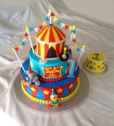 a circus themed birthday cake on a table