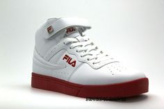 Men's Fila High Top Basketball Shoes. Line up at the key and make your best shot with the Fila Vulc 13 Mid Plus sneakers on your feet! A midrise design combines with a lace-up front, throwback silhouette, and plush comfort to give you a pair of comfy sneaks you'll love. Pair the Vulc 13 Mid Plus with basketball shorts when you're on the court, or wear with denim or sweats for a laid-back casual vibe. Cushioned removable insole Synthetic upper Fila logo Perforations for enhanced breathability Mid Fila Basketball Shoes, Fila Logo, High Top Basketball Shoes, Red Bottom, Ankle Support, Red Sneakers, Red Bottoms, Basketball Shorts, Comfortable Fashion