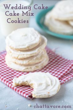 a stack of wedding cake mix cookies on top of a red and white checkered napkin