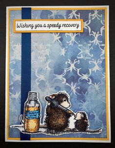 a greeting card with an image of a sheep and a bottle