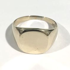 Hi, Here We Have A Beautiful 10k Yellow Gold Signet Ring. Free Engraving. Weigth: 5.4g. Width: 13.75mm. The Perfect Gift For Your Loved One. Comes With A Free Gift Box. Concave Signet Ring With Polished Finish For Anniversary, Minimalist Diamond Cut Round Signet Ring, Minimalist Diamond Cut Signet Ring, Yellow Gold Diamond Cut Signet Ring, Yellow Gold Signet Ring With Hallmarks, White Gold Classic Design Signet Ring, Classic 14k Gold Concave Dome Ring, Hallmarked 14k White Gold Signet Ring, Luxury Round Signet Ring With Hallmarks