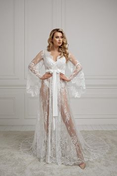 Beautiful long lace bridal robe, the perfect touch to your special day! Make your wedding photos even more memorable by wearing this stunning lace robe while getting ready. Sheer Bridal Gown, Wedding Nightgown, Celestial Realm, Ethereal Elegance, Bridal Nightwear, Lace Bridal Robe, Bridal Robe, Wedding Robe, Night Dress For Women