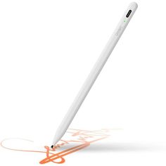 an orange and white pen is laying on the ground