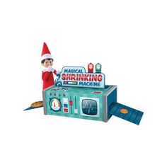 an elf is standing in front of a machine that has the words'warning machine'on it