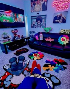 a living room filled with lots of toys and decor on top of carpeted floor