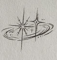 a drawing of a flying saucer with an arrow on it's side in black ink