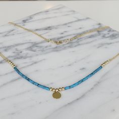 "\"Blue Turquoise Necklace with Gold Coin | Double Chain Necklace with Real Turquoise Gemstone, Solid Gold Beads and Gold Disc Charm | 14k Gold\" Coral Gemstone Variant is also avaliable; https://www.etsy.com/listing/913199443/ ∙ P R O D U C T I O N ∙ ‣ All of our products are handmade and made to order ‣ All of our items are 14K real gold. We do not carry any gold filled, gold plated, or gold vermeil items. Also there are no other metals used so all items are hypoallergenic. ‣ Raw materials are Gold Turquoise Necklace With Polished Beads As Gift, Gold Turquoise Necklace With Round Beads As A Gift, Gold Turquoise Necklace With Round Beads For Gift, Gold Single Strand Turquoise Necklace For Gift, Turquoise Beaded Necklace With Round Pendant Gift, Turquoise Polished Beads Necklace For Gift, Yellow Gold Turquoise Necklace With Round Beads As Gift, Dainty Turquoise Necklace With Round Beads For Gifts, Minimalist Turquoise Necklace With Round Beads