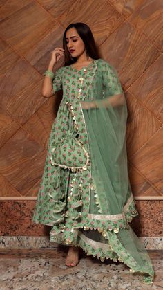 Green Paisely Cotton Hand Block Anarkali Set online in USA | Free Shipping , Easy Returns - Fledgling Wings Traditional Green Floor-length Palazzo Set, Anarkali Palazzo Set In Pista Green With Traditional Drape, Traditional Pista Green Floor-length Palazzo Set, Traditional Maxi Length Gota Work Wear, Traditional Maxi Dress With Gota Work, Traditional Maxi Length Dress With Gota Work, Traditional Zari Work Maxi Length Palazzo Set, Traditional Zari Work Maxi Palazzo Set, Traditional Maxi Palazzo Set With Zari Work