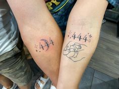 two people with matching tattoos on their legs