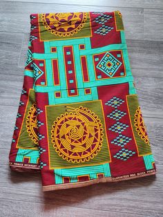 African Ankara Print Fabric. This is fabric is sold by the fold and each fold is approximately a yard.  This fabric is 100% cotton and has a width of 44in.  It can be used make different clothing, quilting and other sewing projects. Purchases of more than a yard, it will come in a continuous piece We ship via USPS First Class Mail, USPS Priority mail or UPS Ankara Print, African Ankara, Fabric Red, Red And Brown, Ankara Dress, African Print Fabric, Ankara Fabric, Gold Fabric, African Fabric