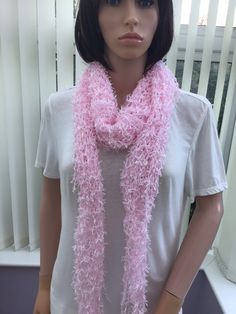 This very pretty, lacy shawl is in shades of pink and white, with an ultra feminine look. It's light & gentle to wear, great for holidays ( easy to pack in a case!) & it's random colour mix means that no two are exactly the same. It would make a unique gift for any lady, good for wearing to an anniversary, wedding, etc, as it's so easy to pair up, with its gentle colour. Approx size - from top to point, 64cm (25") x 158cm (62") across, at the widest point. Hand or machine wash,  dry flat 65.5% polyester, 19% courtelle, 15.5% nylon I have been established for several years, & have won awards for my scarves, as they are so versatile & easy to wear. The shawls/wraps have evolved as a s result of customer requests, & have proved to be equally as popular. I have also been interviewed on local r Lacy Shawl, Ultra Feminine, Holiday Wear, Feminine Look, Anniversary Wedding, Shawls And Wraps, Pink And White, Crochet Scarf, Evening Wear