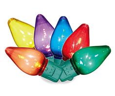 multicolored christmas lights on white background