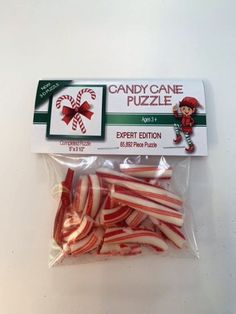 candy canes are wrapped in plastic to look like they're ready for christmas