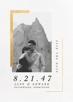 an image of a couple embracing in front of a mountain with the words save the date printed on it